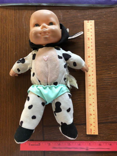 cow baby and rulers for dimensions