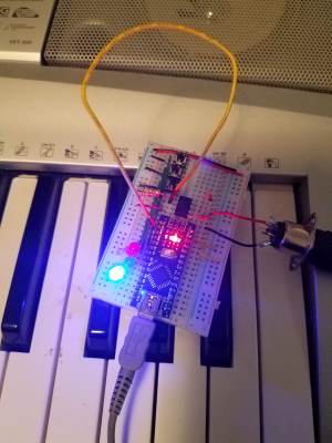 prototype circuit on piano keyboard