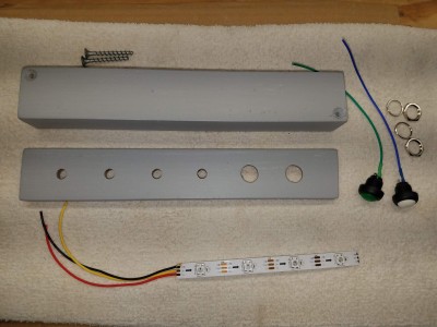 view of the enclosure and electronic parts before assembly